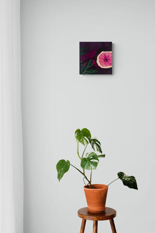 square fig painting on kitchen wall above plant
